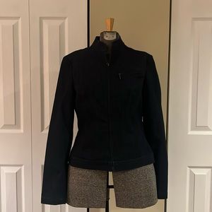 Dark wash denim jacket.